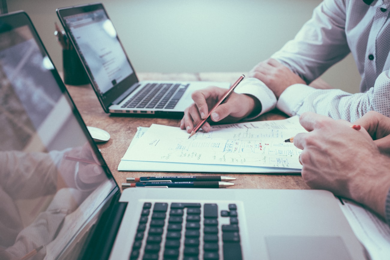 A Ledgerwise accountant reviewing financial reports with a client